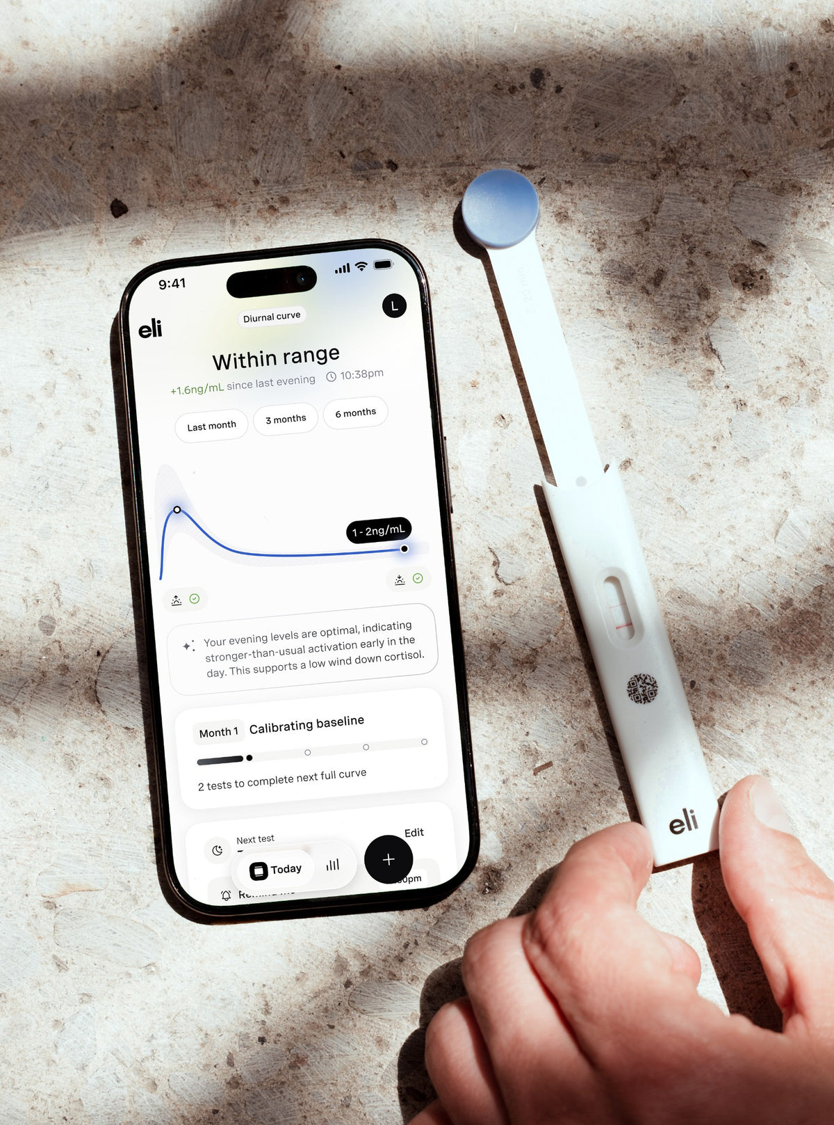 Eli app results screen next to a Hormometer test